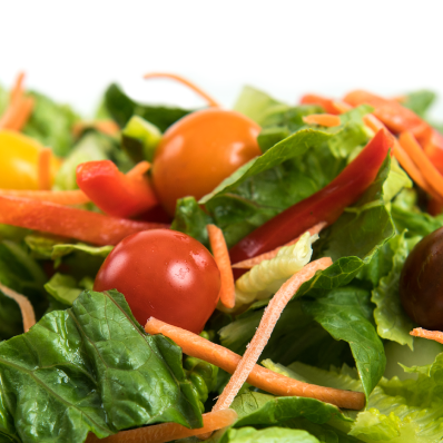 Salad greens with tomatoes.