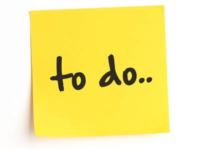 A post-it with &#8220;to do&#8230;&#8221; written on it.