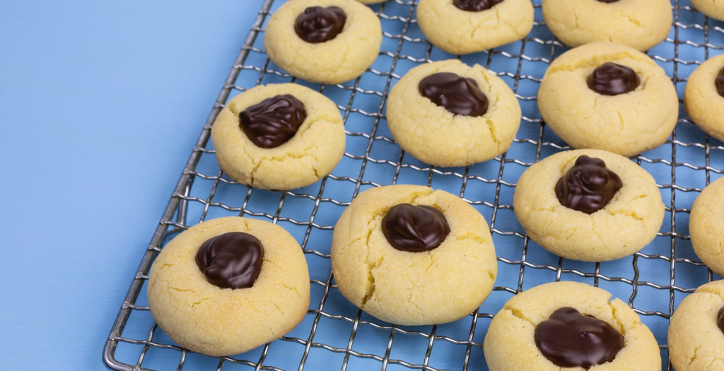 thumbprint cookies on a cooling rack