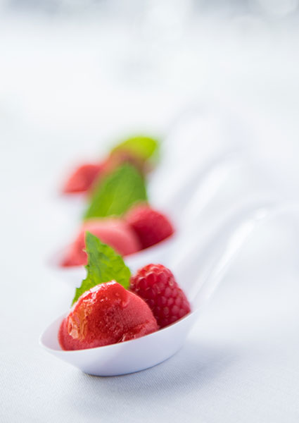Raspberry sorbet on Japanese serving spoons